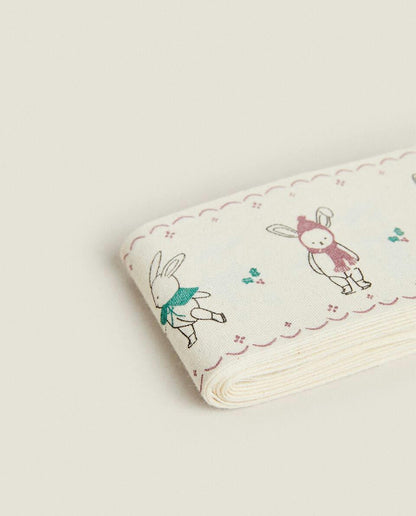 CHILDREN’S WRAPPING PAPER WITH CHRISTMAS BUNNY RABBITS